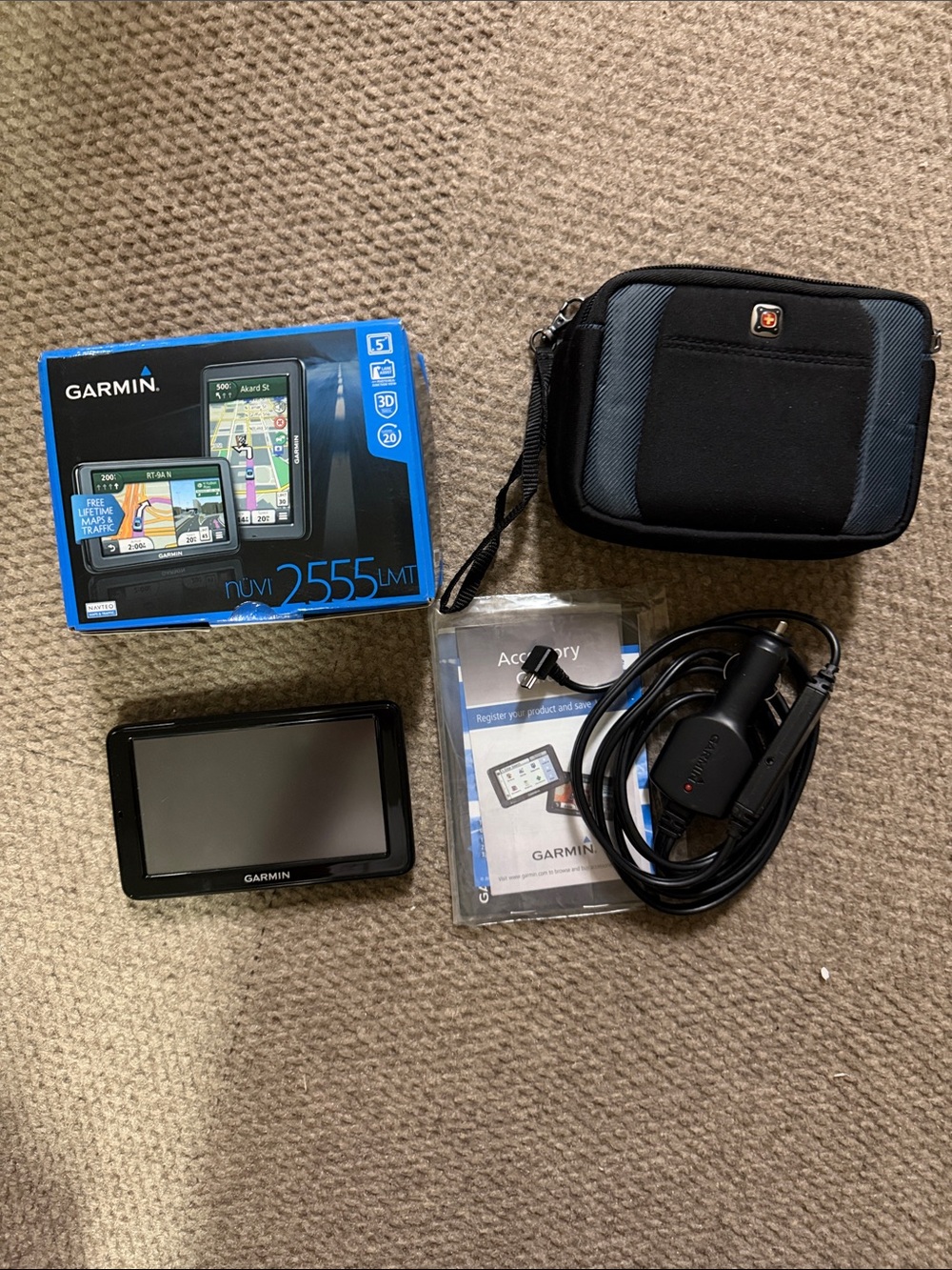 garmin portable GPS navigator with black & blue zip case